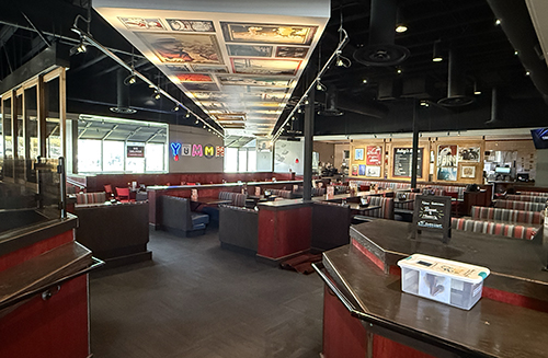 Red booths and tables in the main Red Robin dining room