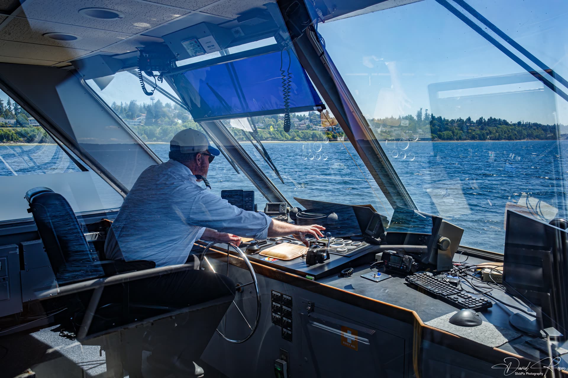 View of navigation controls and windows inside the Lady Mary wheelhouse.
